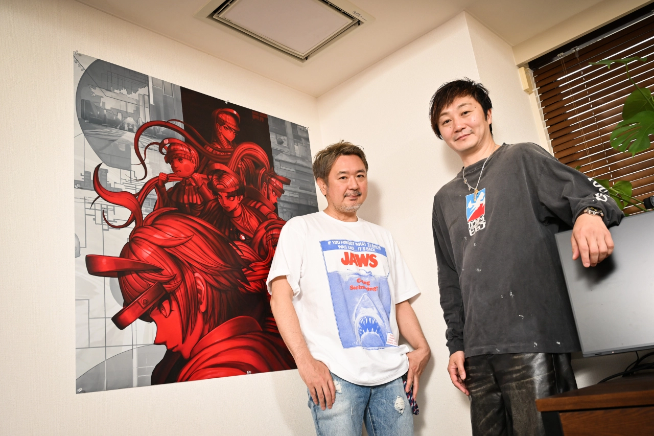 小高和刚(照片右)与打越钢太郎(照片左)